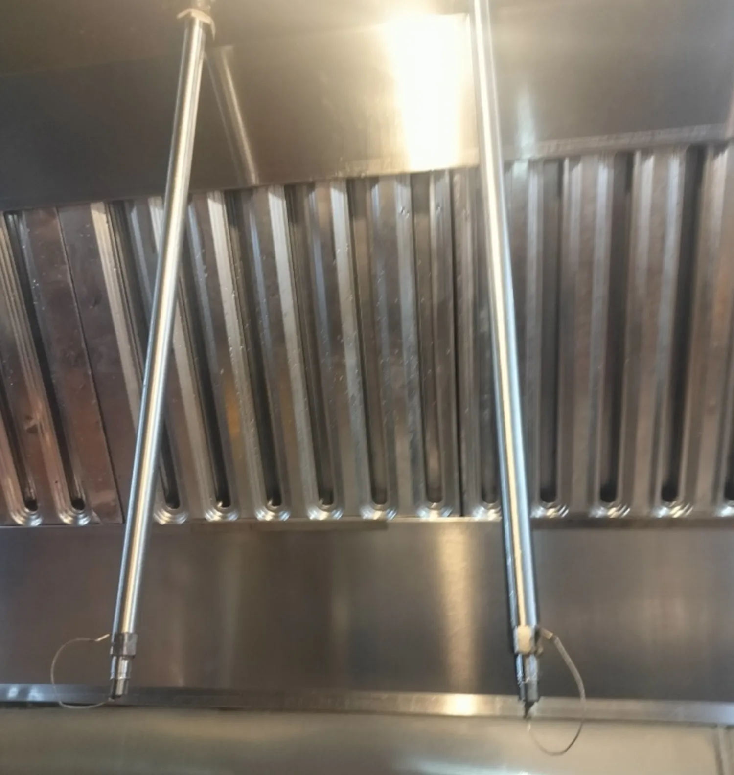 Cleaned Filters in Commercial Kitchen Hood with Fire Suppression System